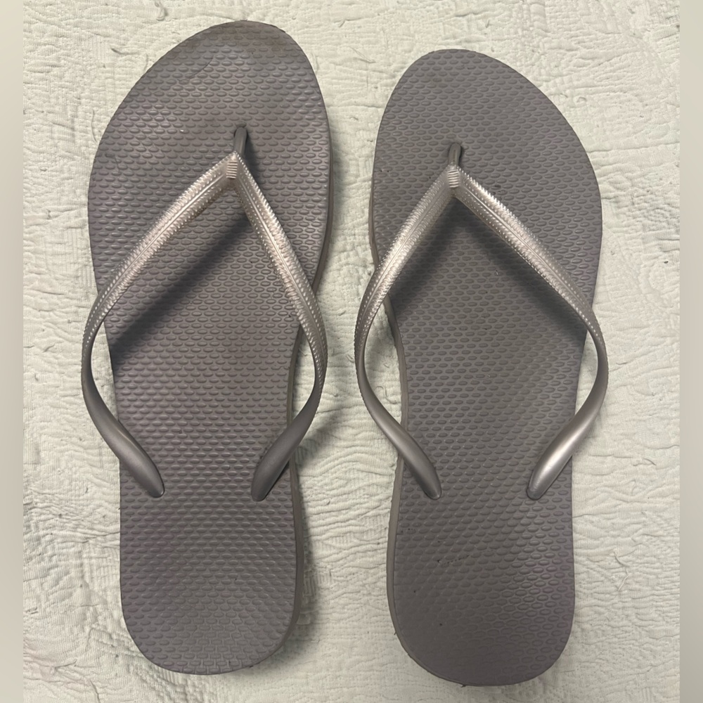 Gray flip flops